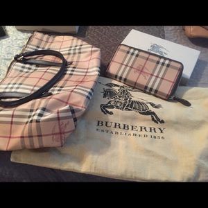 Burberry purse w/ matching zip up wallet .
